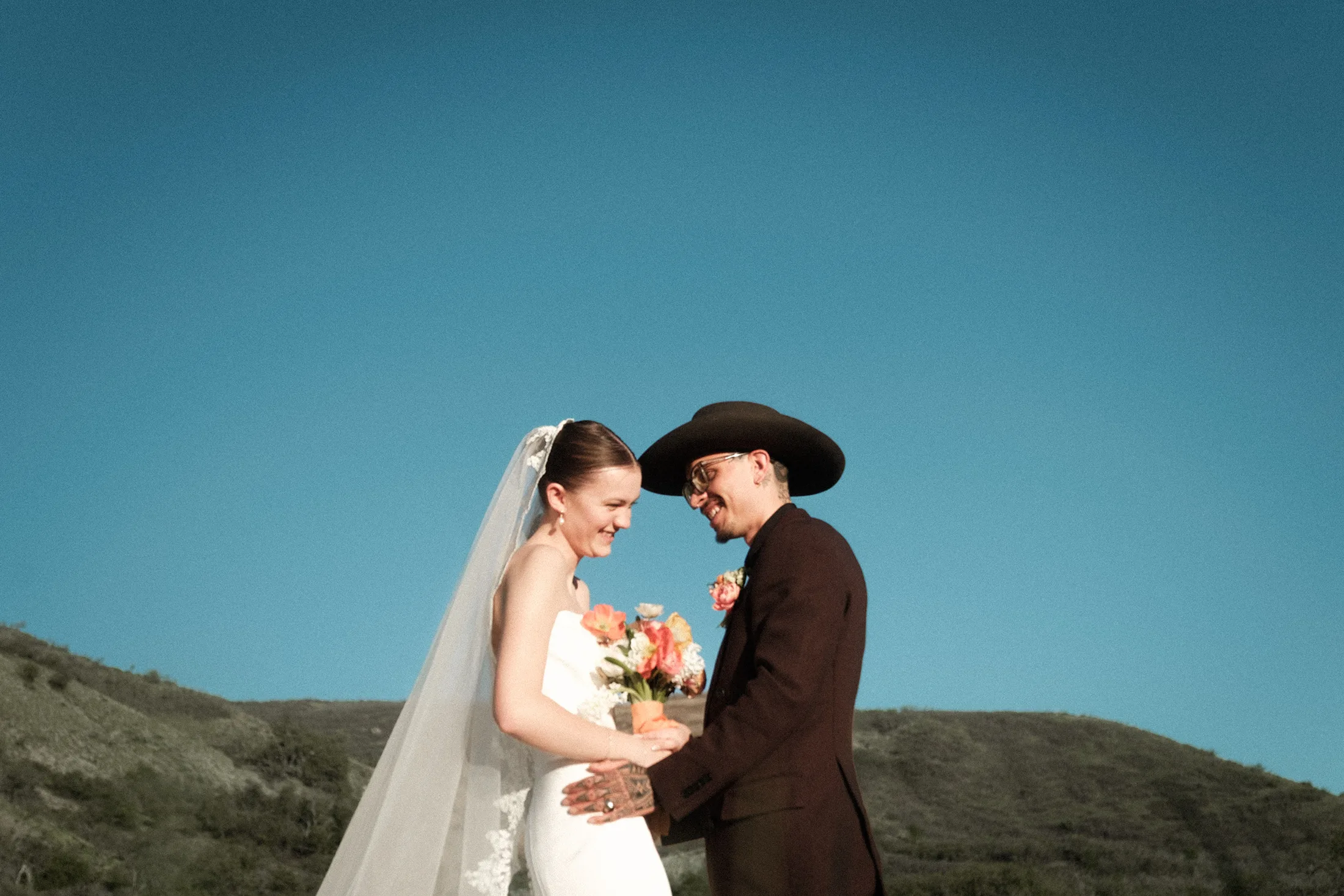 Isaac & Whitney wedding cover photograph